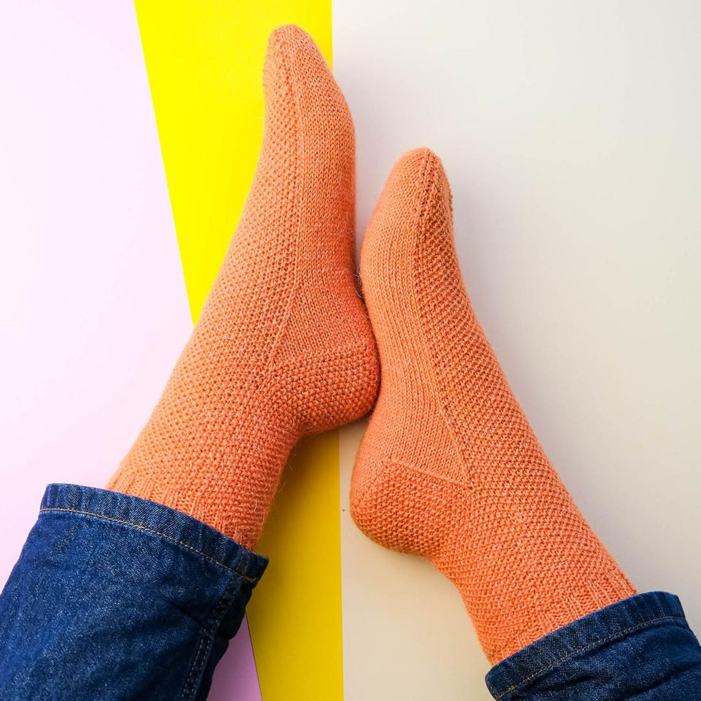 Knitting kit orange socks